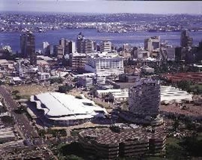 Recently extended to add an indoor multi-purpose arena, the IPVS 2008 venue at the International Convention Centre of Durban in South Africa is identified in this view by its large white roof in the foreground, next to the Hilton hotel. (Photo by Dudley Randall, Turner Group South Africa)
