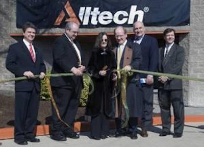 President of Alltech, Dr. Pearse Lyons cuts the ribbon at Alltech Algae in Winchester alongside his wife Deirdre (center), (from left) Judge Executive Branham, Mayor Burtner, Secretary Hayes, and Alltech’s CFO Nathan Hohman.