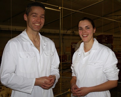 Gosse Veninga, left, Cobb European research director stands with geneticist Marieke Meeuwes at Cobb’s Herveld pedigree farm.