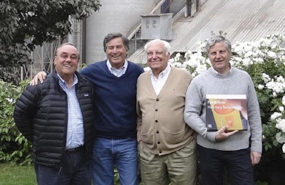 Ariztía and Pas Reform company representatives celebrate the plans to partner on a hatchery expansion project. | Pas Reform