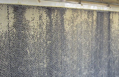 Cooling-pad maintenance is important to avoid system problems, as in this photo, which could reduce bird performance due to heat stress. | Auburn University National Poultry Technology Center