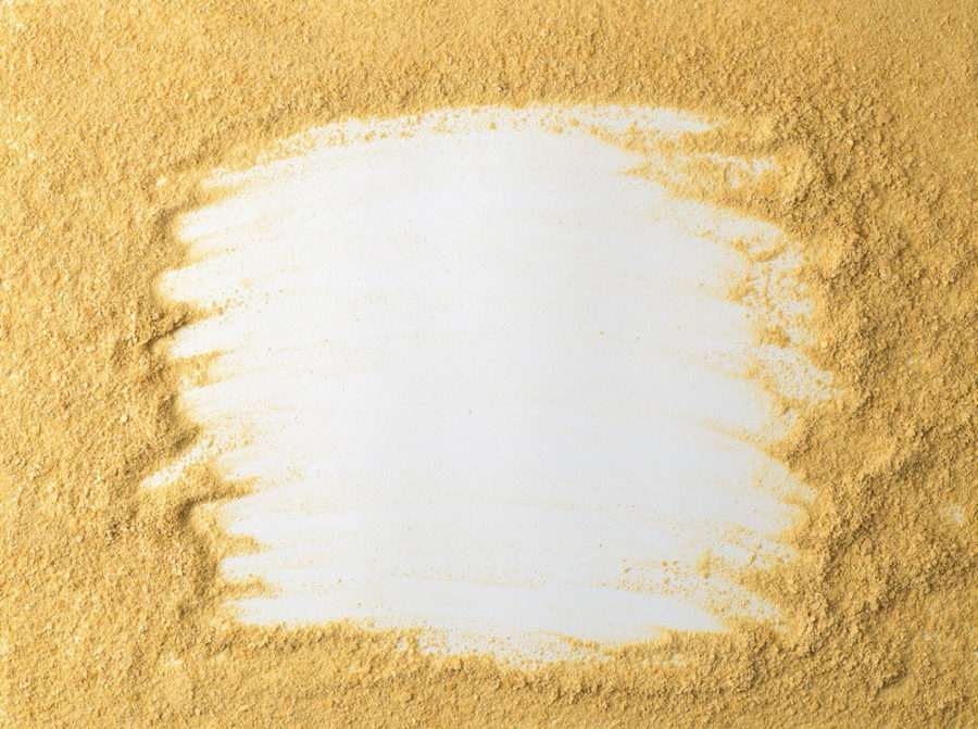 Nutritional Yeast On White Background. Nutritional Inactive Yeas