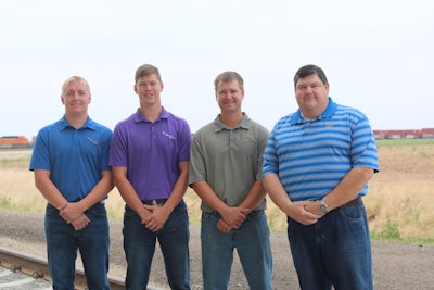 (From left) Cole Leis, crop insurance specialist, Team Marketing Alliance (TMA); Todd Schultz, grain marketing specialist, TMA; Lawson Hemberger, grain operations manager, MKC; Jeff Jones, director of Southern operations, MKC.