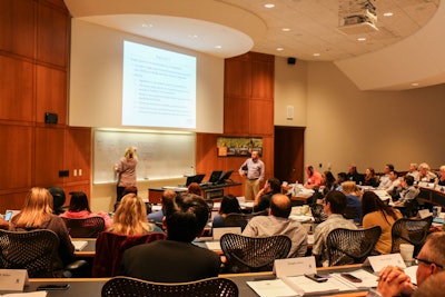 Cassandra Jones, associate professor in animal sciences and industry, discusses animal food safety hazards in an exercise during the NGFA–KSU Food Safety Modernization Act (FSMA) Industry Training. Photo by NGFA–KSU