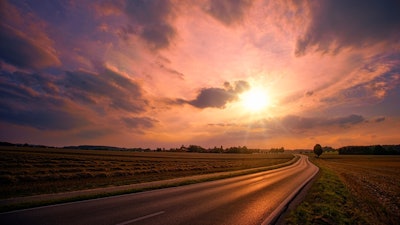 Rural road at sunset