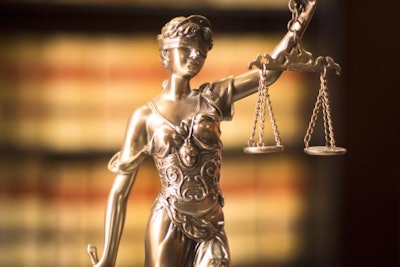 Legal office of lawyers and attorneys legal bronze model statue of Themis goddess of justice.