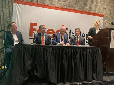 (L-R) Aidan Connally with AgriTech, Peter Ensch with WEM Automation, Loren Field with Younglove Construction, Scott Anderson with CPM, and Elise Schafer with Feed & Grain