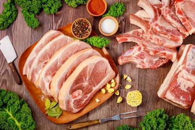 Cut Pork Meat Chop Bone In And Pork Belly On Wooden Table..