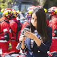 Jounalist with fire crews behind her via pixabay mar 2022