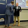 David Toland, Kansas Lieutenant Governor & Secretary of Commerce, presents the Award to Michael Hinton, AgTrax director of Sales & Marketing. Photo: AgTrax