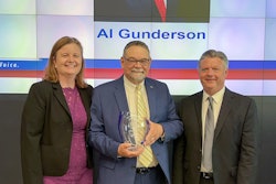 AFIA's Sarah Novak (left) and AFIA 2021-22 Board Chair Mike Schuster (right) present Al Gunderson with the AFIA Distinguished Service Award. Photo: AFIA