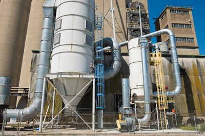 A dust explosion starting in a bucket elevator can potentially travel to larger downstream volumes such as silos and upstream material handling systems. Photo: BS&B Pressure Safety Management