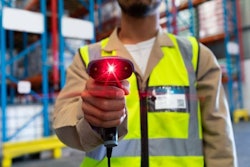 Employee scanning warehouse barcode 1
