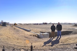DTI President Chuck Sjogren and Vice President Greg VerSteeg at the construction site of the new facility. Photo courtesy of DTI