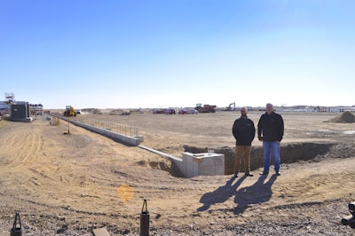 DTI查克干燥总统和副总统Greg VerSteeg at the construction site of the new facility. Photo courtesy of DTI