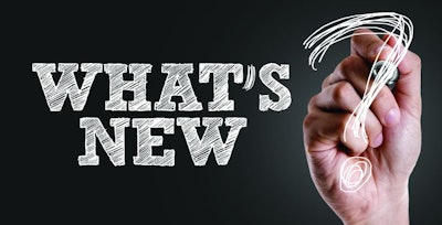 Hand writing the text: Whats New?