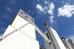 Feed mill against blue sky