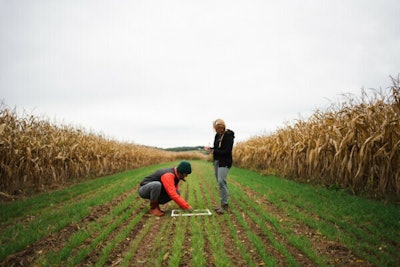 Rodale Institute research technicians collect data for the Farming Systems Trial. Photo courtesy of Rodale Institute