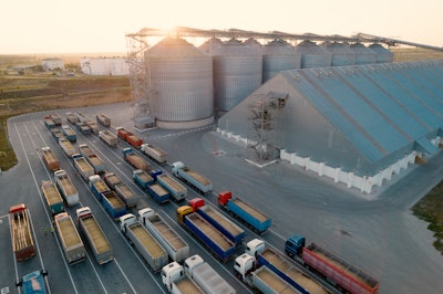 Grain Trucks Waiting At Terminal To Be Unloaded