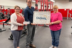 Lorena Garcia, Didion administrative assistant (left), and Chris Johnson, Didion executive assistant (right), present a $3,000 check to Wyatt Tramburg (center).