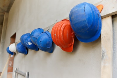 Hard Hats Hanging On Wall Newarta Pixabay com