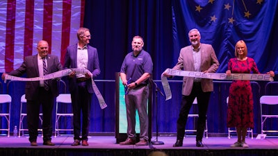 POET general manager Jeremy Jacobs cuts the ribbon at the Cloverdale reopening.