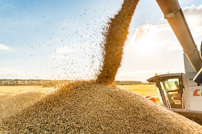 Combine Harvester With Pile Of Wheat Aleksandr Rybalko Bigstock