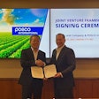 POSCO International vice chairman and CEO Jeong Tak (left) and Savage president and CEO Kirk Aubry (right) during the joint venture framework agreement signing ceremony on September 25, 2023 in Kansas City, Missouri.