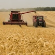 Golden Wheat Harvest With Tractor In Field Stanvpetersen Pixabay