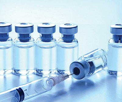 Vaccine Vials With Syringe