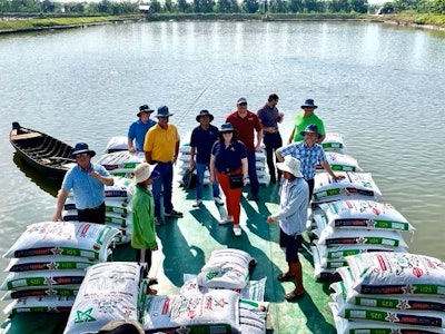 Feeding time at Vinh Hoan Pangasius Farm in Vietnam, the site of past U.S. Grains Council (USGC) distiller's dried grains with solubles (DDGS) and sorghum feeding trials. Vinh Hoan's largest export market is the United States