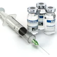 Syringe With Vaccine In Vials