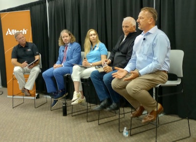Mark Hulsebus, Mark Lyons, Maria Zieba, Gordon Spronk and Frank Mitloehner take part in a panel discussion at World Pork Expo.