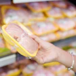 Cost Conscious Consumer Buying Chicken