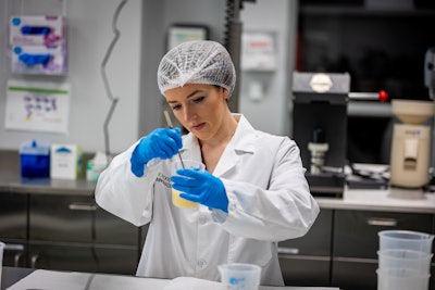 North Carolina Food Innovation Lab Food scientist Chloe Brubaker hydrates a protein for use in a food formulation.