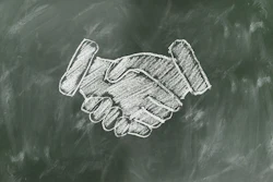Shaking Hands Drawn Chalk Board