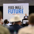 Keynote speaker addressing the audience at the 2024 Feed Mill of the Future Conference.