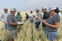 The U.S. Grains Council (USGC) recently organized farm visits, educational opportunities and business-to-business meetings between a major Mexican brewing company and stakeholders in the U.S. barley industry. Pictured, Montana Wheat and Barley Board Member Kevin Bradley (second from left) speaks to attendees about his crop and shares an informational brochure about barley production and applications he created with his children.