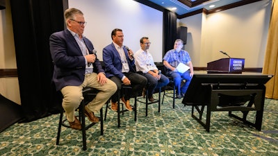 BAADER Poultry USA CEO Oliver Hahn, Marel Inc. regional sales director Jay Russel and SEE North America executive director of bags and case-ready product marketing Shawn Harris during a panel discussion at the 2024 Chicken Marketing Summit