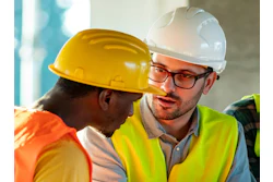 Manager Talking To Employee
