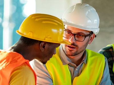 Manager Talking To Employee