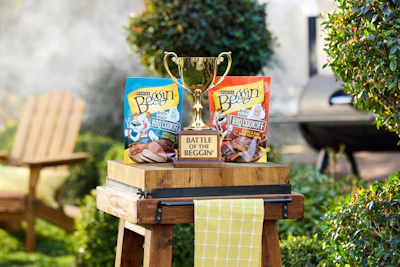 Purina Beggin' BBQ Cookoff trophy display with dog treat packages on wooden stand