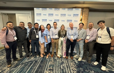 U.S. Grains & BioProducts Council's Marketing Specialist Angélica Ríos (fifth from right) and USGBC Regional Consultant Alejandro Gonzalez (fourth from right) recently led a team of Latin American poultry industry stakeholders to the 2025 Chicken Marketing Summit in Savannah, GA.