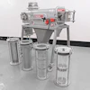 Industrial metal filtering machine with multiple cylindrical filter containers