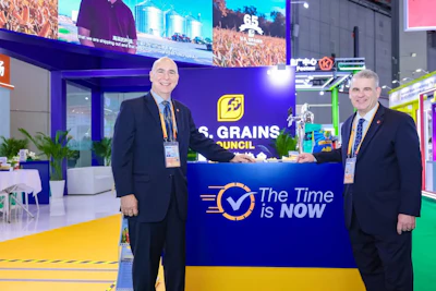 U.S. Grains & BioProducts Council (USGBC) Chairman Mark Wilson (left) and USGBC Vice President Cary Sifferath (right) were among the Council's participants at the 8th China International Import Expo (CIIE).