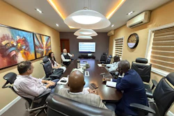 U.S. Grains & BioProducts Council (USGBC) Deputy Regional Director for Africa Mohamed Salah Bouthour (near, leftmost) recently traveled to Ghana and Nigeria to examine the results of a feed trial using U.S. distiller's dried grains with solubles (DDGS).