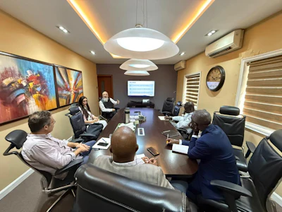 U.S. Grains & BioProducts Council (USGBC) Deputy Regional Director for Africa Mohamed Salah Bouthour (near, leftmost) recently traveled to Ghana and Nigeria to examine the results of a feed trial using U.S. distiller's dried grains with solubles (DDGS).