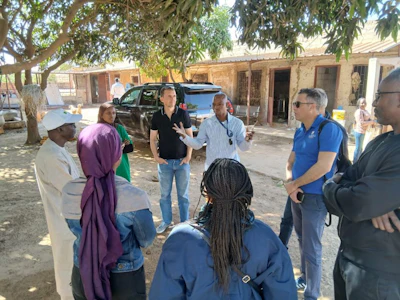 The U.S. Grains & BioProducts Council (USGBC) recently held concurrent training sessions for poultry and dairy sector leaders in Senegal. USGBC Deputy Regional Director for Africa Mohamed Salah Bouthour (second from right) is pictured at a visit to a dairy farm to analyze and improve production methods.