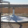 Covered ground pile being filled at harvest.