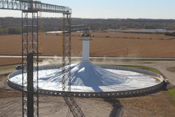 Covered ground pile being filled at harvest.